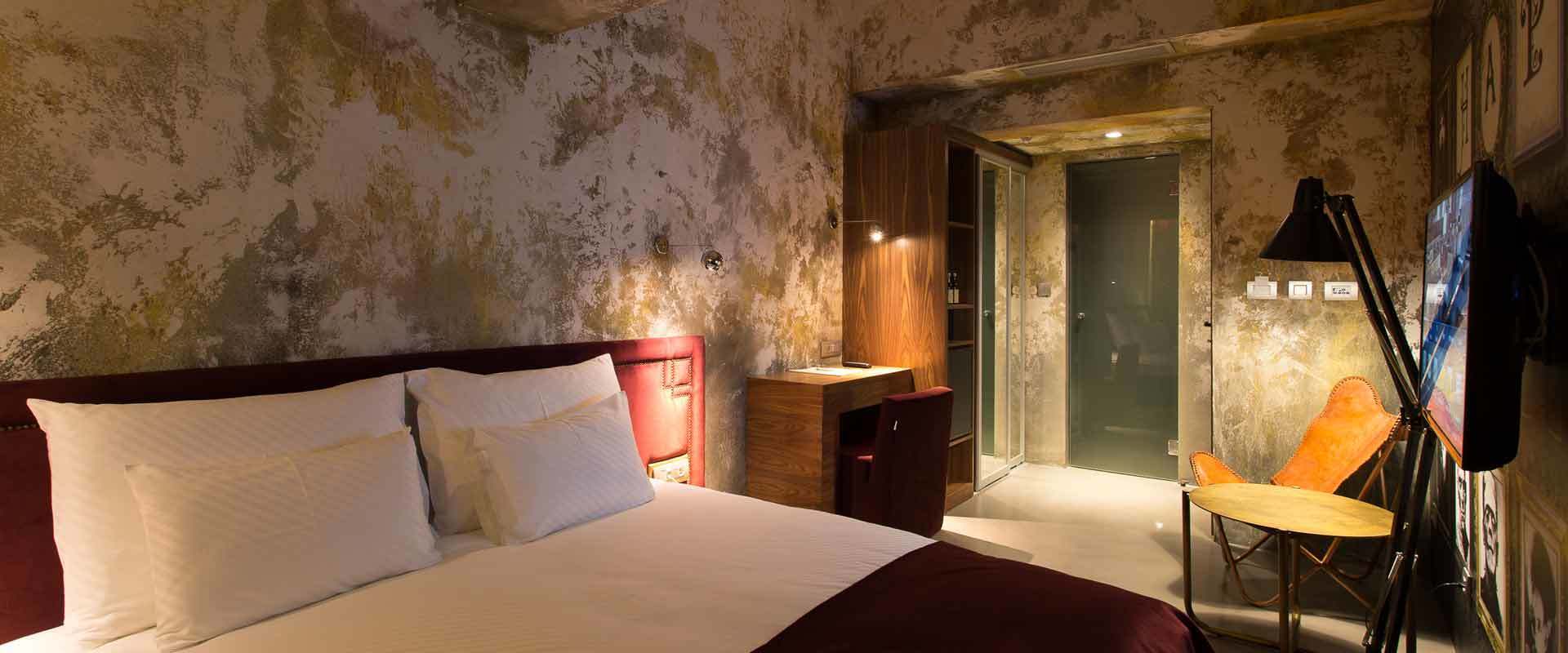 Hotel Hemera Podgorica Bagian luar foto A room at the hotel
