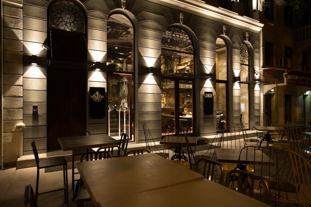 Hotel Hemera Podgorica Bagian luar foto The restaurant at night