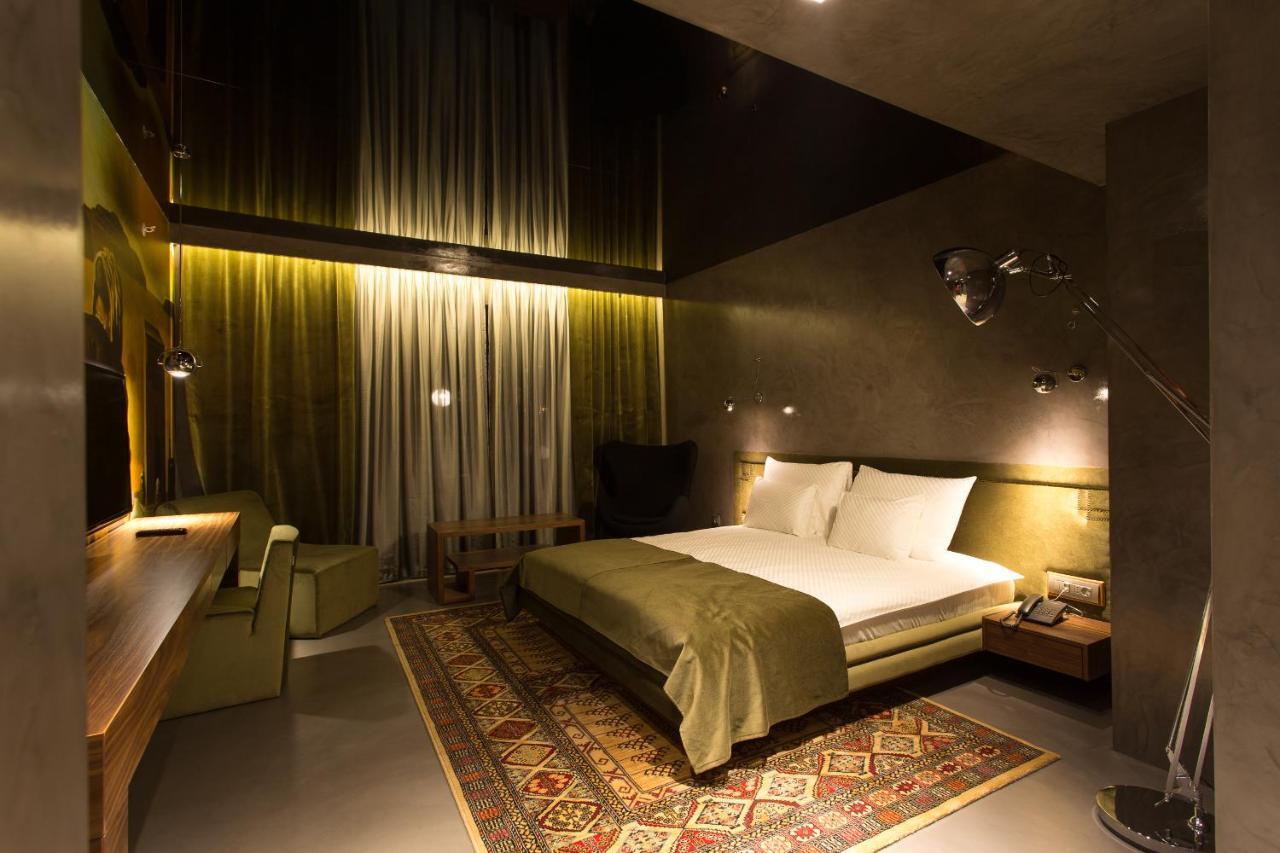 Hotel Hemera Podgorica Ruang foto A room at the hotel